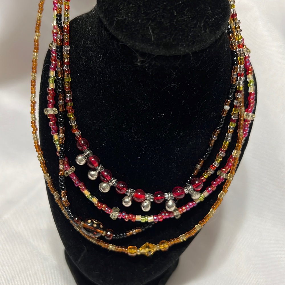 Four Handmade Beaded Necklaces.